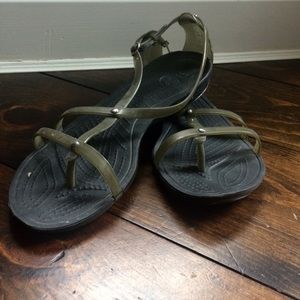 Gray strappy sandal.